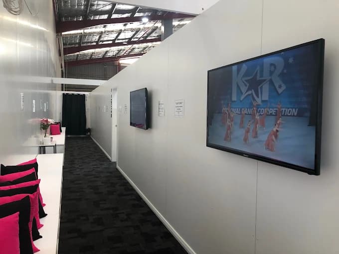 SDS Griffith waiting area with comfortable seating and performance screens